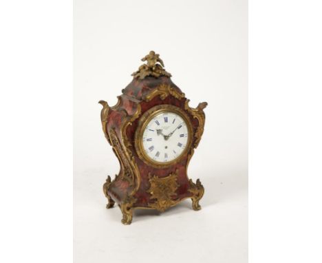 VULLIAMY: A TORTOISESHELL AND ORMOLU MANTEL CLOCK, the white enamel dial signed 'Vulliamy, London 1889', with blue enamelled 