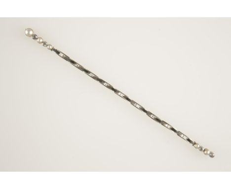 AN EARLY 20TH CENTURY PEARL AND DIAMOND BRACELET, the top section individually millegrain collet-set with five graduated half