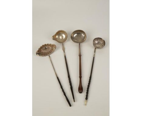 A GEORGE II PUNCH LADLE with turned wooden handle and plain oval bowl, makers mark rubbed, London 1737, 13" long, a Continent