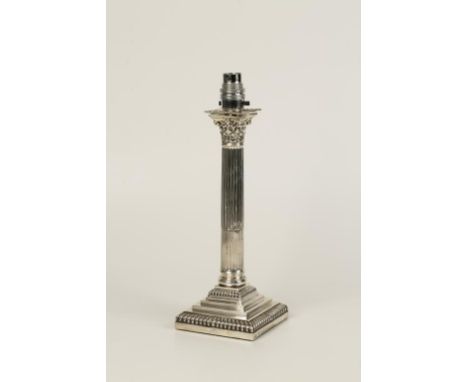 A CORINTHIAN COLUMN CANDLESTICK (later converted to a standard lamp base), of conventional form, by Hamilton & Inches, Edinbu