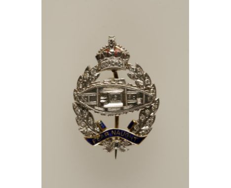 MILITARY INTEREST: A ROYAL TANK REGIMENT BROOCH modelled in unmarked white metal as a tank within a diamond-set crowned wreat