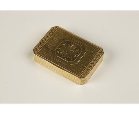 A RUSSIAN GOLD SNUFF BOX of canted rectangular form, the lid with wave engine-turned engraving enclosed within twist borders,