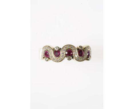 A RUBY AND DIAMOND HALF ETERNITY BAND, the top half of the undulating 18ct yellow gold band millegrain set with diamond accen