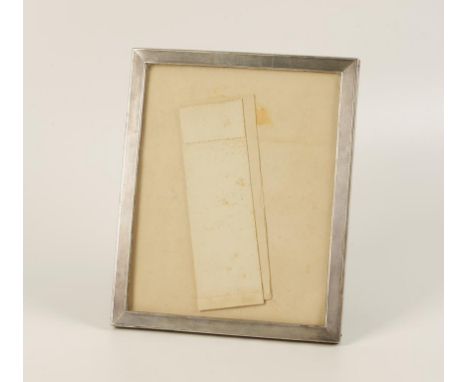 A CONTINENTAL PHOTOGRAPH FRAME of rectangular form with engine-turned decoration and wooden strut back, stamped marks of "Fra