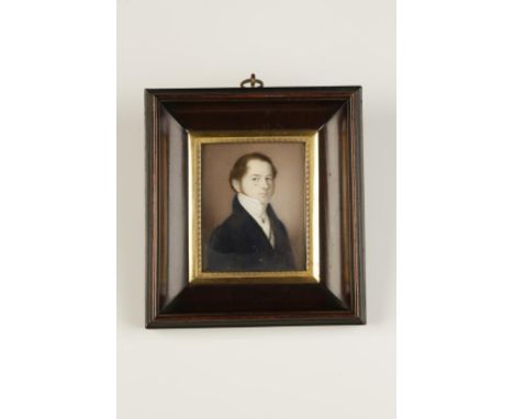 A PAINTED PORTRAIT MINIATURE OF A GENTLEMAN, wearing a blue jacket, in a wood frame with gilt metal slip, signed "Fran Sacco"