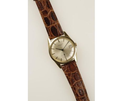 PATEK PHILLIPE: A GENTLEMAN'S 18CT YELLOW GOLD WRISTWATCH, the round dial with raised baton numerals, subsidiary seconds dial