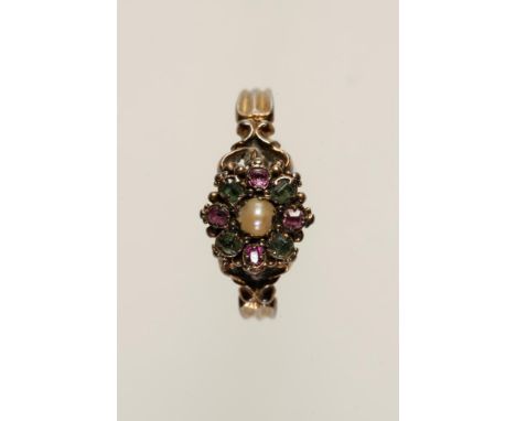 AN EARLY 19TH CENTURY GEMSTONE CLUSTER RING claw-set to the centre with a round pearl and surrounded by a rub-over border of 