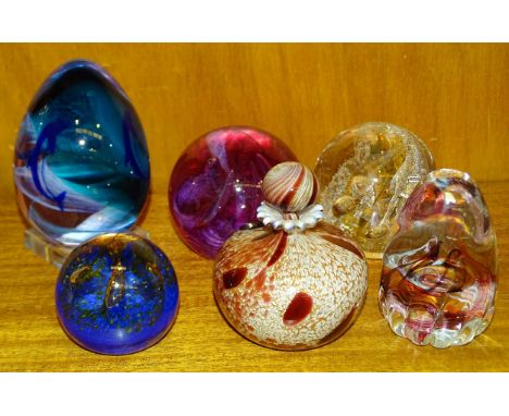 A Caithness "Fiesta" globe paperweight and other Caithness and Selkirk paperweights, (6). 