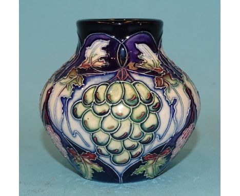 A small modern Moorcroft ceramic pot of baluster shape, line-decorated with grapes and vines, painted and printed marks for 2