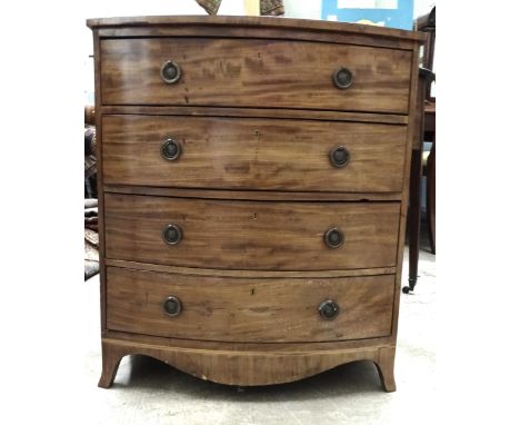 A mahogany bow-fronted chest of four small drawers, on bracket feet, 63cm wide, 72cm high and a damaged mahogany fire screen 