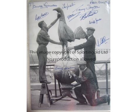 TOTTENHAM B/w 16 x 12 photo of the famous cockerel being cleaned by ground staff at White Hart Lane in 1934, signed in blue m
