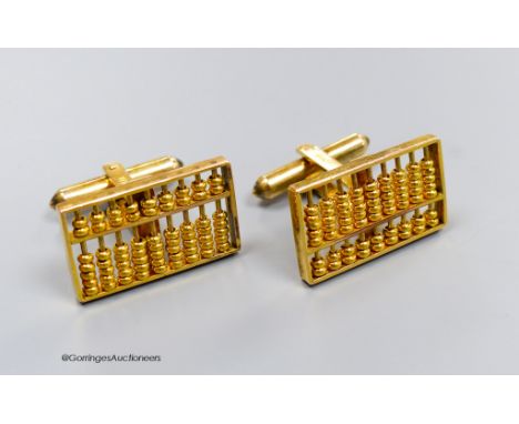   A pair of 14k yellow metal "abacus" cufflinks, 11grams.