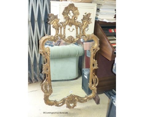   A reproduction rococo gilt mirror. W-48, H-84cm.