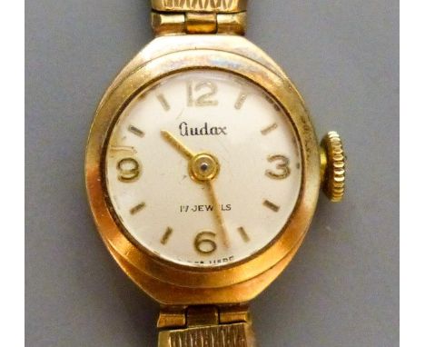   A lady's Audax 9ct gold manual wind wrist watch, on a 9ct gold bracelet,gross 18.2 grams, in Audax box.