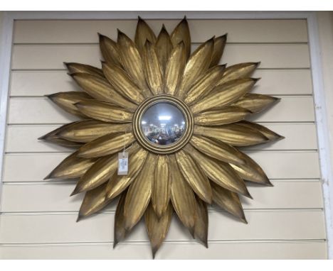 A contemporary gilt metal sunflower convex wall mirror. D-86cm.