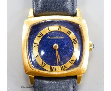   A lady's? 18k yellow metal Jaeger LeCoultre manual wind dress wrist watch with lapis lazuli dial (with loose Roman chapter 