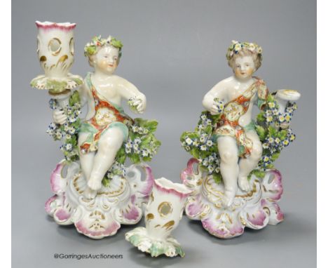   A Derby good pair of candlestick figures of children, 18cm high