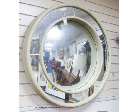   A Julian Chichester marginal plate convex wall mirror. D-102cm.