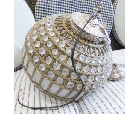  An Eastern silvered metal and opaque glass spherical ceiling light. D-34cm.