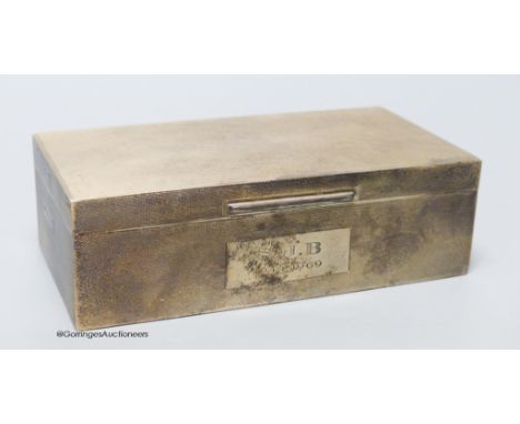   A late 1960's engine turned rectangular silver cigarette box, by Mappin &amp; Webb, Birmingham, 1968, 16.6cm, gross 16.5oz.