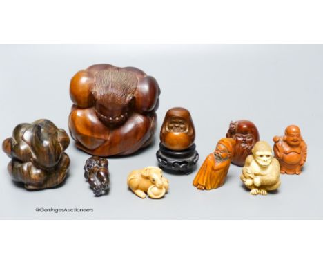   A collection of netsuke, and other carvings, tallest 10cm