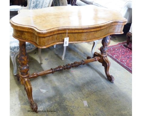   A Victorian pollard oak folding card table of rectangular serpentine form (faded) W-108, D-58, H-76cm.