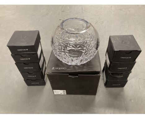 An Orrefors Swedish Crystal vase, in retail box, together with nine further small crystal dishes by the same manufacturer 