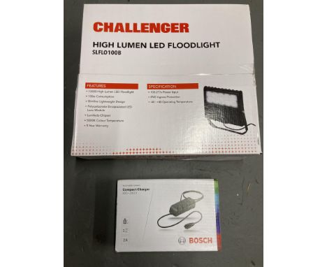 A Challenger high lumen LED floor light  together with a Bosch E-bike systems compact charger 