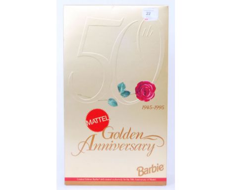An original Mattel made Barbie 'Golden Anniversary' edition Barbie doll. 14479. Appears unused, within the original box. With