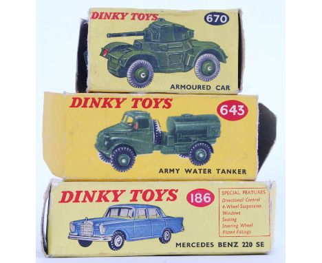 A collection of 3x boxed vintage Dinky diecast model cars - 670 Armoured Car, 643 Army Water Tanker and 186 Mercedes Benz (on