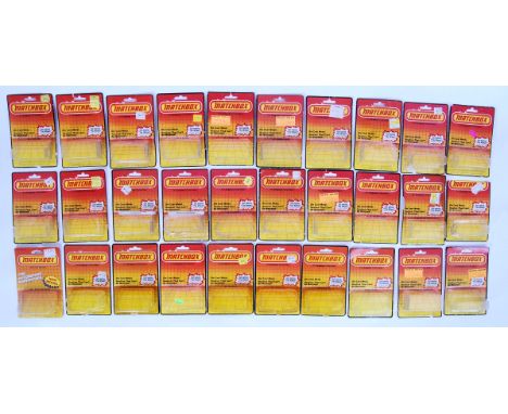 A collection of 37x original vintage Matchbox EMPTY orange back card backs / blister boxes for models. Each with bubble attac