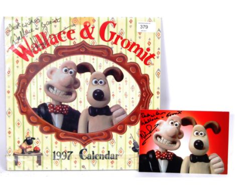 Two pieces of Wallace &amp; Gromit / Aardman memorabilia - both signed by creator Nick Park. The first being a 1997 calendar 