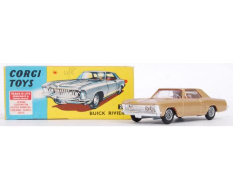 An original vintage Corgi Toys diecast model 245 Buick Riviera. Bronze, with red interior. Very near mint model, within a ver