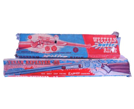 Two original vintage 1950's Cowboy plastic toy rifles. The first being a 'Western Water Rifle ' and the other a 'Texan Repeat