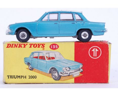 An original vintage Dinky diecast model 135 Triumph 2000 car, within the original box. Opening boot and bonnet.&nbsp;
