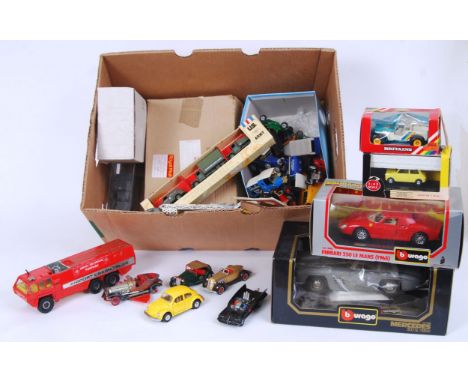 A collection of assorted boxed and loose vintage diecast models to include; 1:18 scale Burago, Britains 9421 Jeep, Lledo, Mat