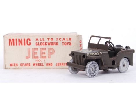 A vintage original Minic tinplate clockwork ' Jeep ' No. 1. Within the original box.