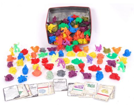 A large collection of vintage Mini Boglins figures - many with their accompanying stats card. Various characters, shapes and 
