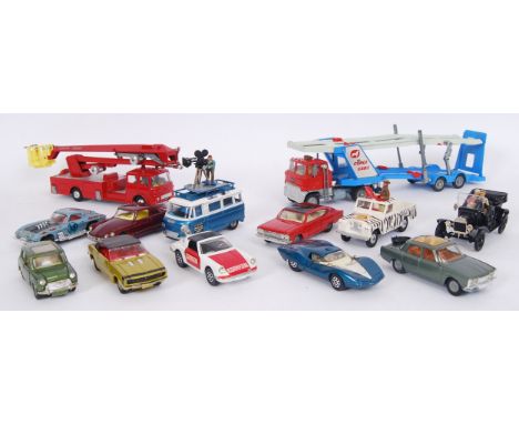 A good collection of 13x vintage Corgi diecast model cars and other vehicles. To include Simon Snorkel Fire Engine, Film Serv