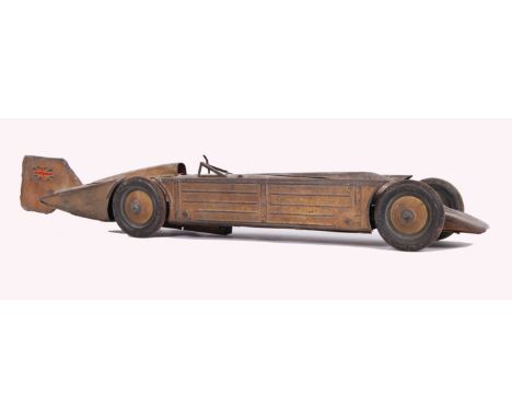 A rare antique Gunthermann made tinplate clockwork model, of 'The Golden Arrow' land speed record car c1929. The tail fin dec