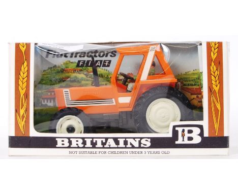 An original vintage Britains diecast model Farm 9528 Fiat Tractor. Mint, within the original box.