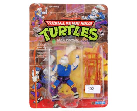 An original vintage carded Playmates Teenage Mutant Ninja Turtles action figure ' Usagi Yojimbo ' . 19 back.