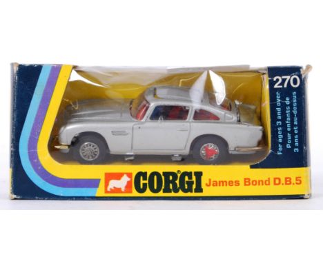 A vintage original Corgi Toys diecast model 270 James Bond Aston Martin. Within the original box.