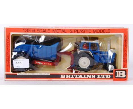 An original Britains diecast model Farm 9630 Ford Tractor &amp; Rear Dump set. Mint, within the original box.