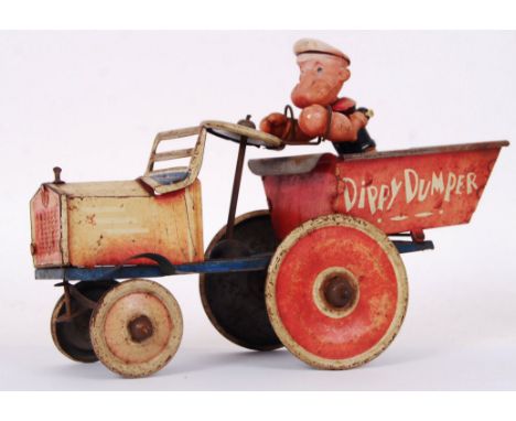 A rare vintage 1950's Marx Toys ' Dippy Dumper ' tinplate clockwork toy, featuring Popeye to the top. Lithograph printed tin 