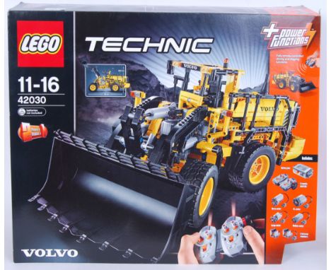 A rare Lego Technics set 42030 Volvo L350f Wheel Loader. 100% complete and made, fully working electric functions (with contr