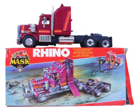 An original 1980's vintage Kenner made MASK action figure vehicle set ' Rhino '. Within the original box, with 1x original fi