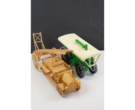A scratch built wooden model of a fire engine together with a wooden scratch built model of a steam engine both made from mat