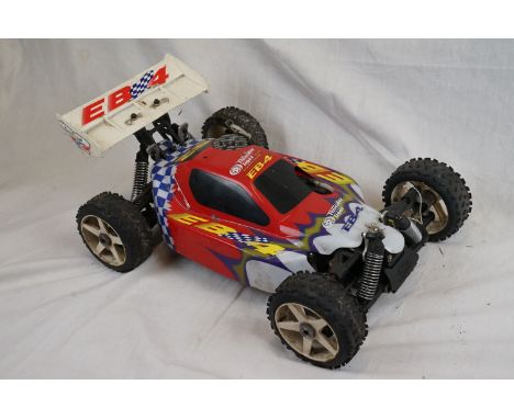 A Thunder Tiger team international EB4 1/8 scale Nitro buggy 4WD. 