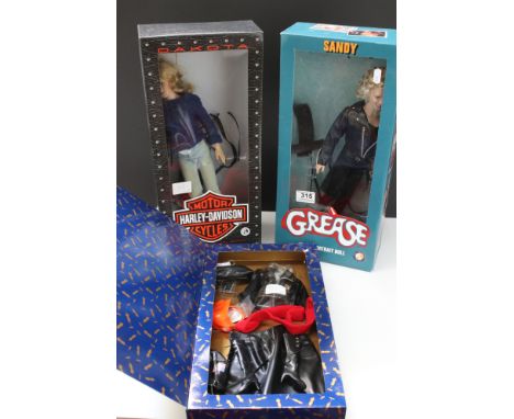 Two boxed Franklin Mint vinyl dolls to include Grease Sandy and Harley Davidson, both vg, previously on display, plus a boxed